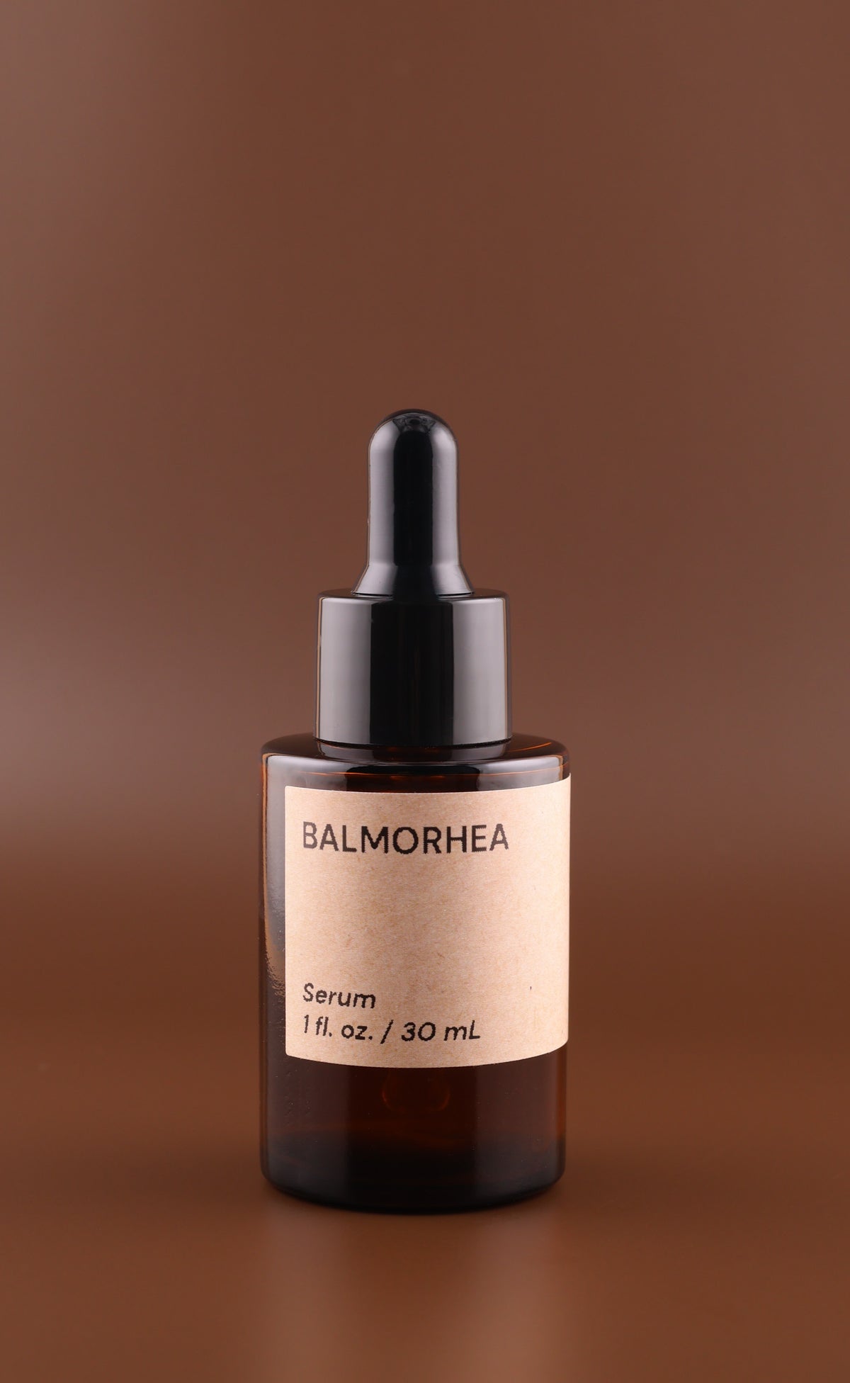 Balmorhea facial serum in an amber glass bottle