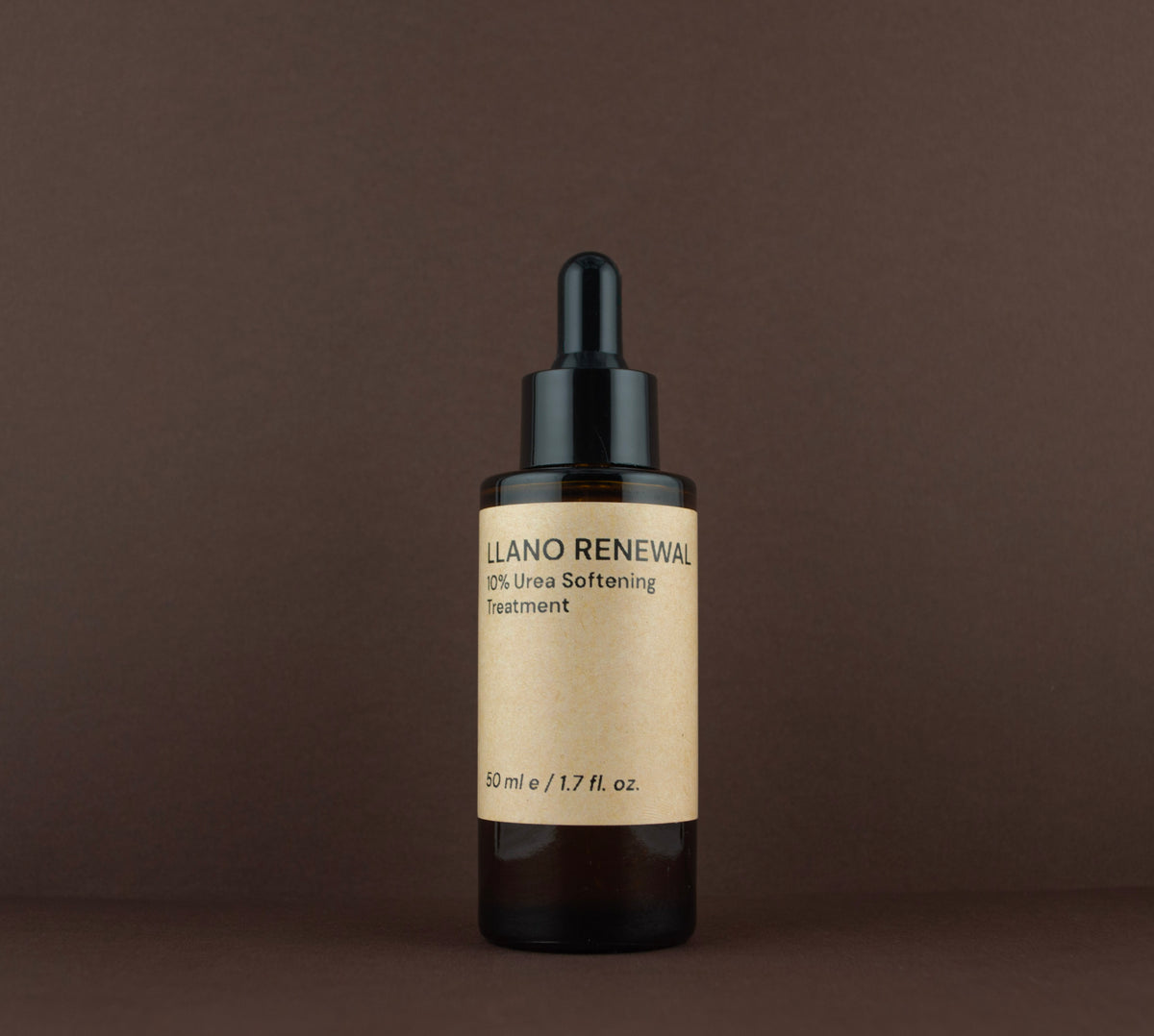 Front view of Llano Renewal 10% Urea Softening Treatment (50 ml / 1.7 fl. oz.) in an amber glass dropper bottle.