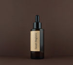 Side view of the Seven Regions Llano Renewal 10% Urea softening treatment amber glass bottle.