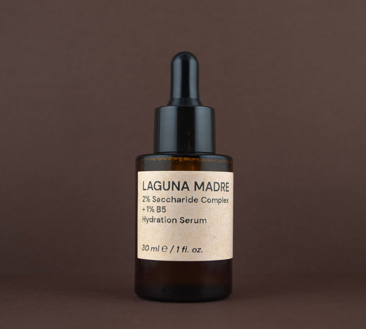 Front view of Laguna Madre 2% Saccharide Complex + 1% B5 Hydration Serum (30 ml / 1 fl. oz.) in an amber glass dropper bottle.