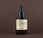 Front view of Trinity 9% Brightening Actives + 6% Firming Peptide Complex (30 ml / 1 fl. oz.) in an amber glass dropper bottle.